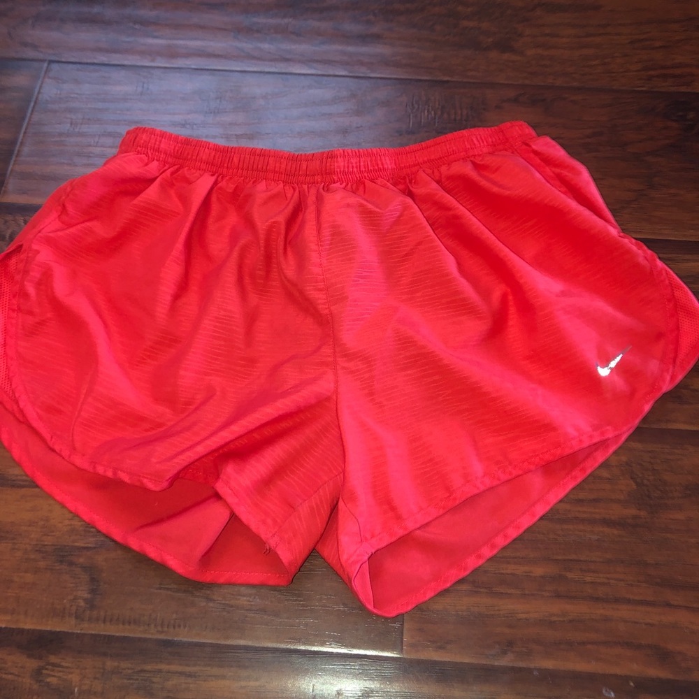 Red Nike shorts